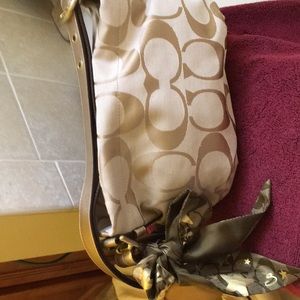 Gold/tan signature small Coach bag